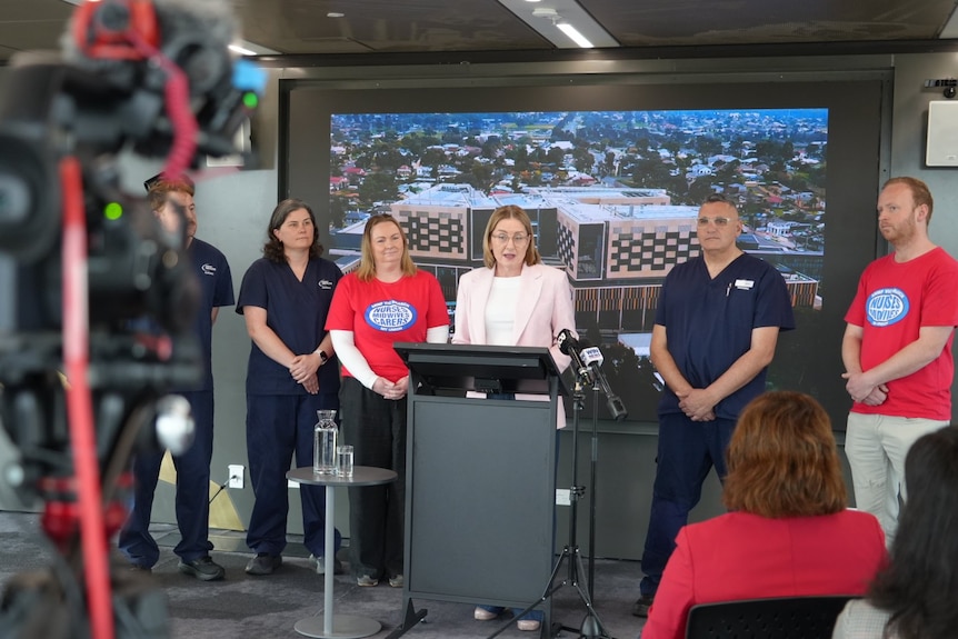A wide view of a press conference where Jacinta Allan is announcing her resignation from politics