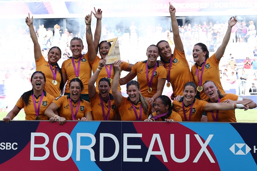 Australia celebrates winning Bordeaux leg of rugby sevens World Championship.