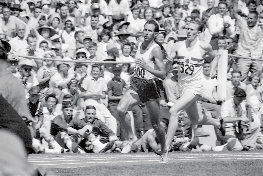 Roger Bannister leads John Landy in the mile in an old picture from 1954