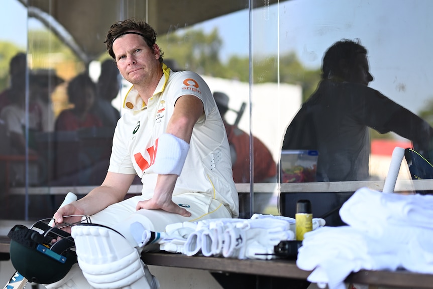 Steve Smith looks to one side