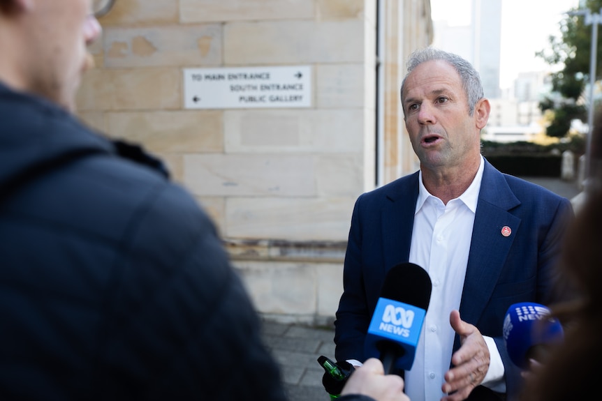 Rod Caddies speaks to journalists outside WA Parliament.