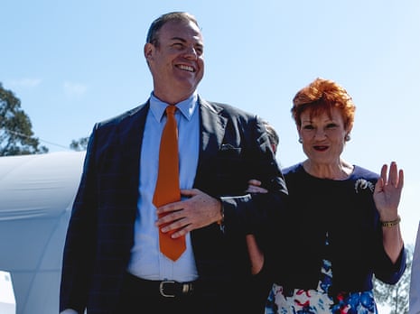 Mike Newman and Pauline Hanson leave a One Nation media call on Friday.