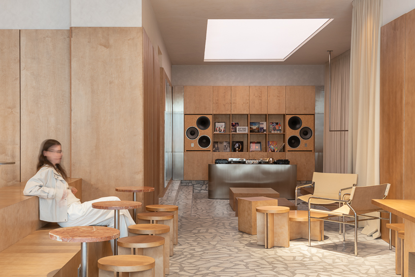 ukyo X blends café, listening bar, and co-working inside restored historic interior in romania - 2