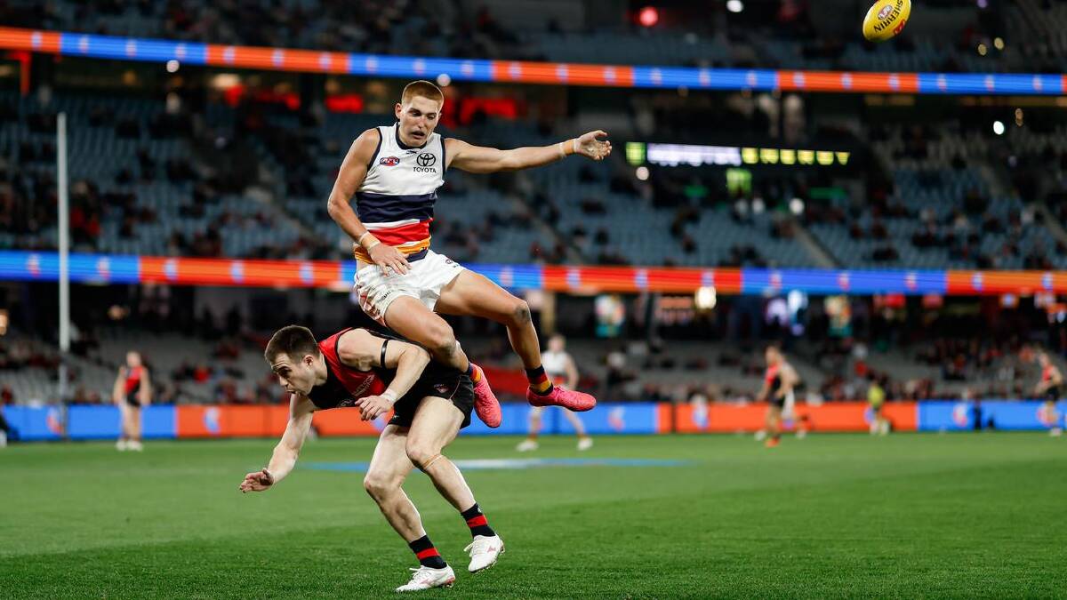 Zach Merrett provided a focal point for the Bombers ... and a seat for Oscar Ryan. (Dylan Burns/AAP PHOTOS)