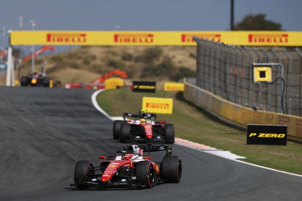 Charles Leclerc leading Lewis Hamilton, Ferrari
