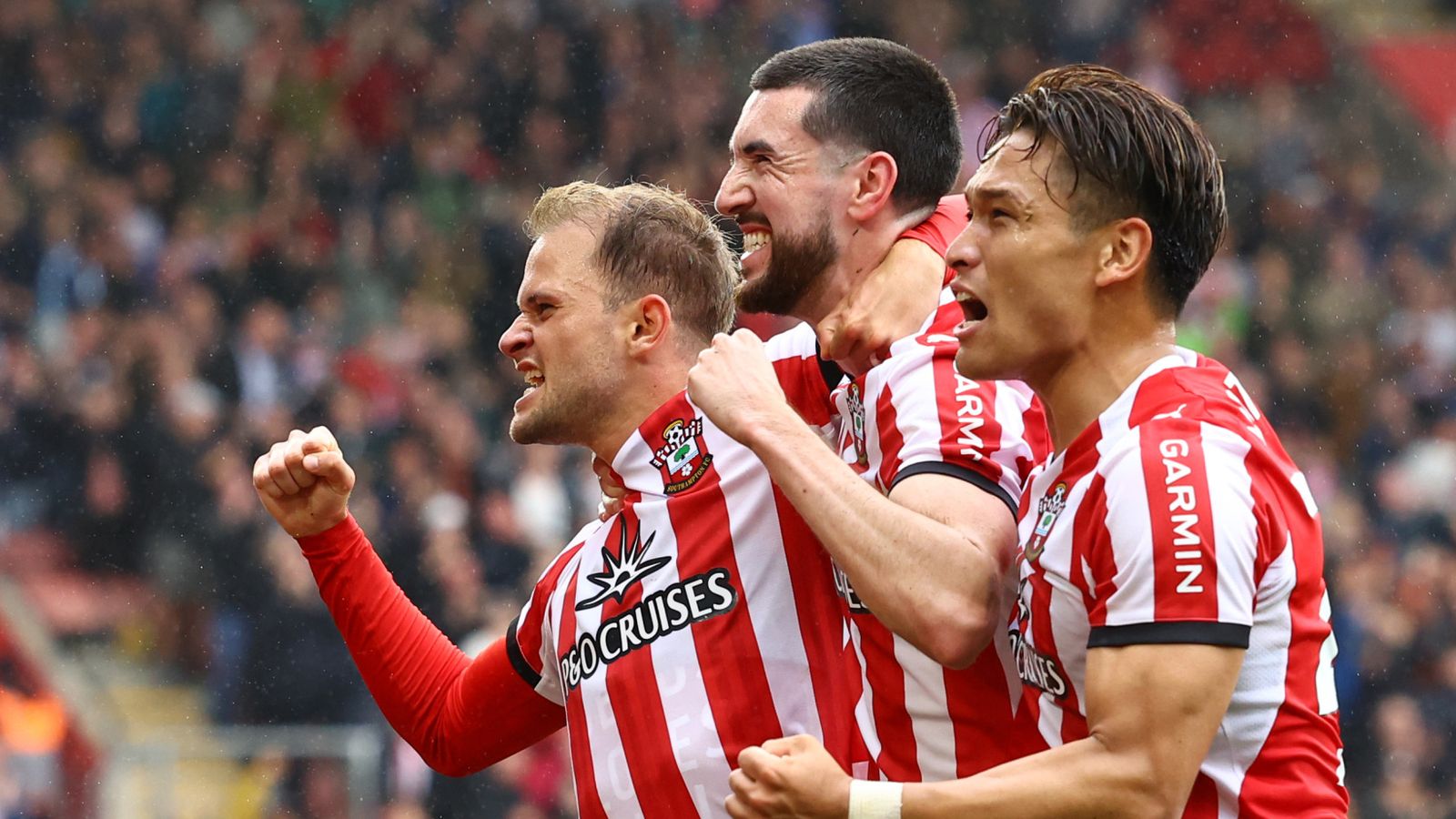 Leo Scienza, Finn Azaz and Kuryu Matsuki of Southampton celebrate a goal during the 5-1 win over Millwall