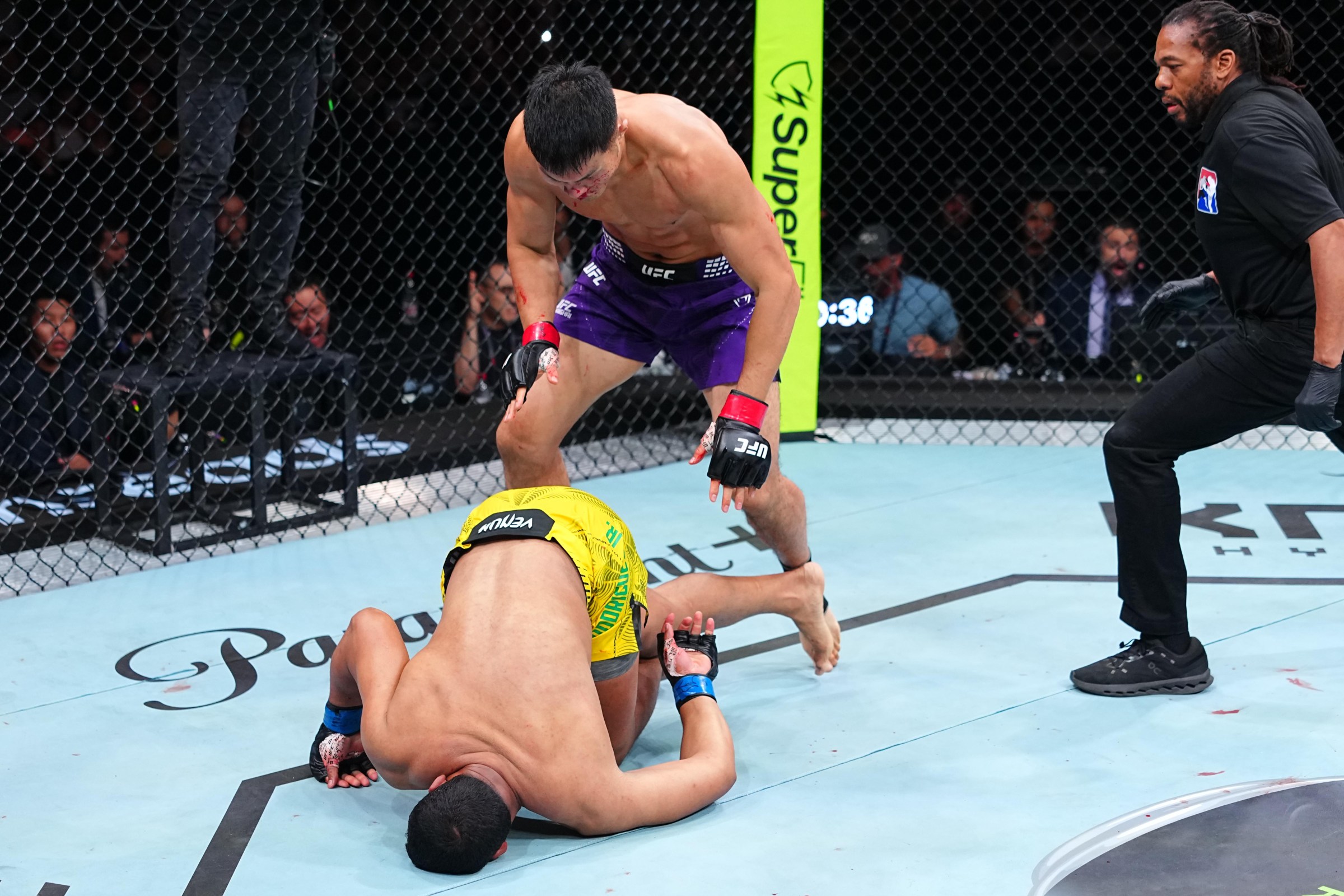 SHANGHAI, CHINA - AUGUST 29: Liu Ce of China knocks out Levi Rodrigues Jr. of Brazil in a light heavyweight fight during the UFC Fight Night event at SPD Bank Oriental Sports Center on August 29, 2026 in Shanghai, China. (Photo by Chris Unger/Zuffa LLC)