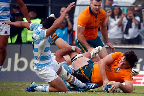 Tom Hooper crosses for a crucial try for the Wallabies.