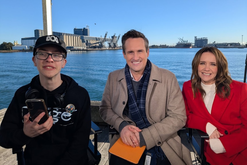 a group of presenters sitting with Hayden Eastbury