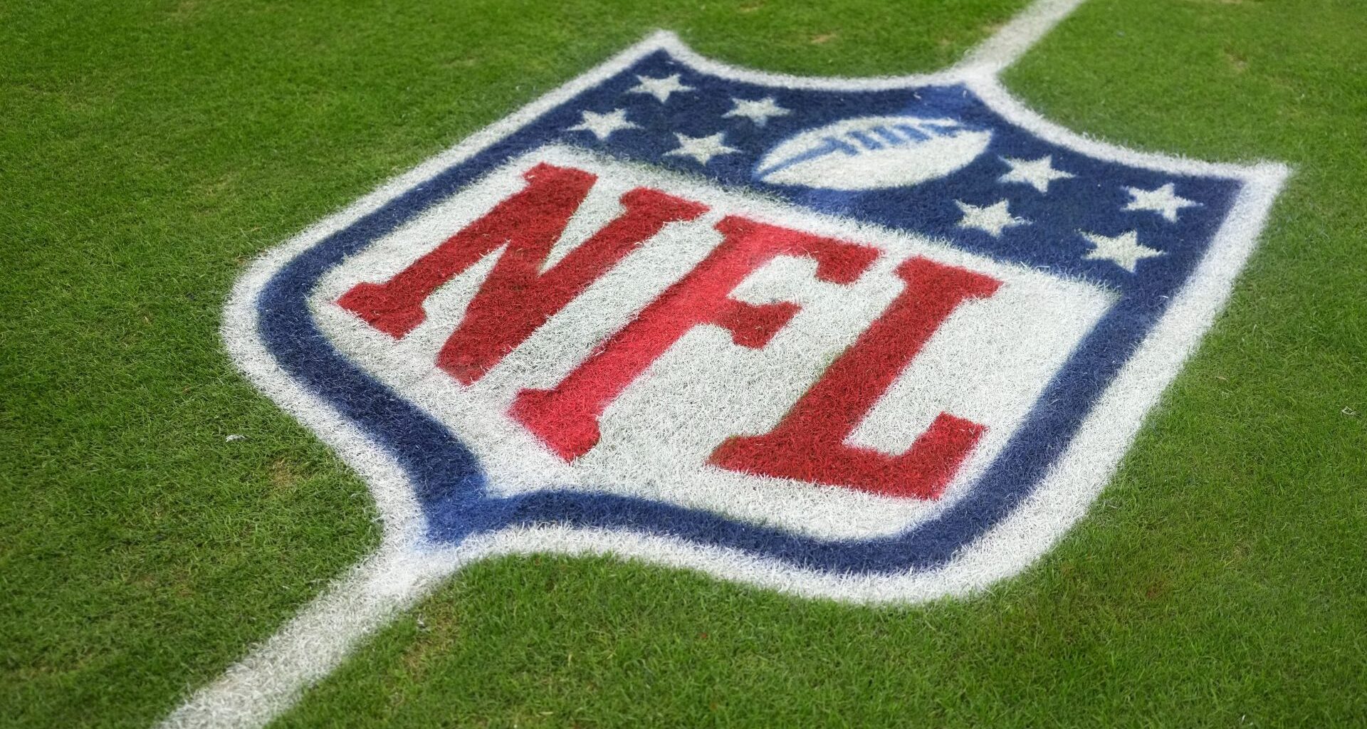 Nov 23, 2025; Paradise, Nevada, USA; The NFL shield logo on the field at Allegiant Stadium. Mandatory Credit: Kirby Lee-Imagn Images
