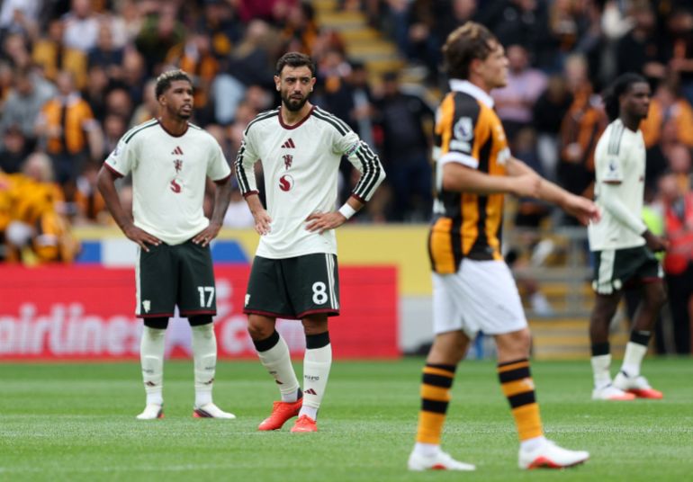 Manchester United's Bruno Fernandes reacts after Hull City's Nobel Mendy scores their second goal