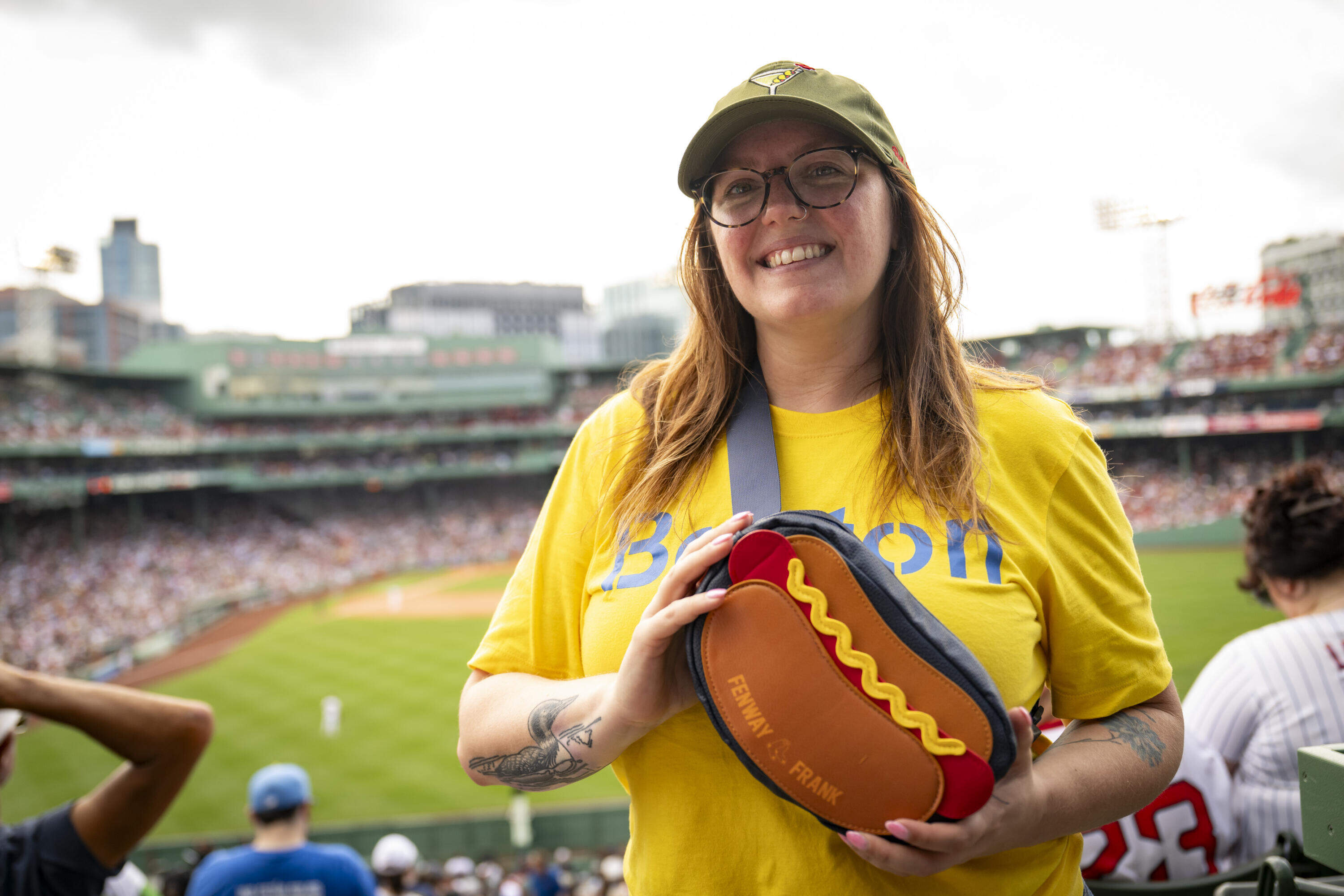 A fan poses with a hot dog bag during game one of a doubleheader between the Baltimore Orioles and Boston Red Sox at Fenway Park on July 22, 2026. (Rachel O’Driscoll/Boston Red Sox)