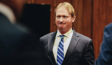 Jon Gruden leaves court after appearing at a hearing for oral arguments in a legal fight betwee ...