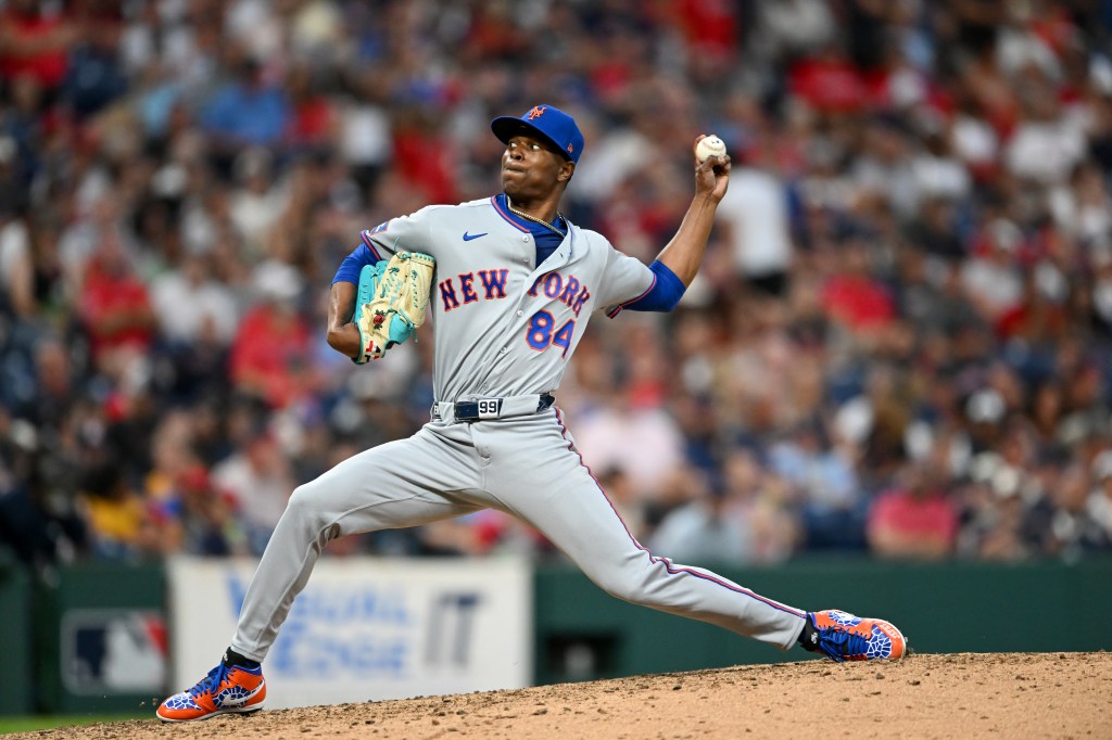 Jefry Yan of the New York Mets throws a pitch during the sixth inning of his major league debut against the Cleveland Guardians at Progressive Field on August 5, 2026, in Cleveland, Ohio. 