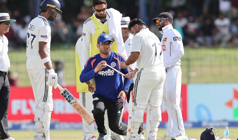 Rishabh Pant recieves attention from physio before wallking off the field on Day 1 of the 2nd Test against Sri Lanka in Colombo on Sunday Rishabh Pant recieves attention from physio before wallking off the field on Day 1 of the 2nd Test against Sri Lanka in Colombo on Sunday