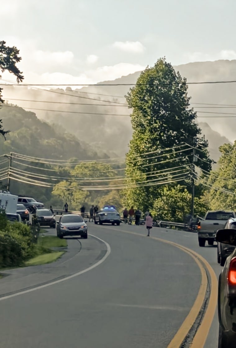 Traffic stopped along Highway 19 after a motorist struck members of the Milligan University cycling team Wednesday.