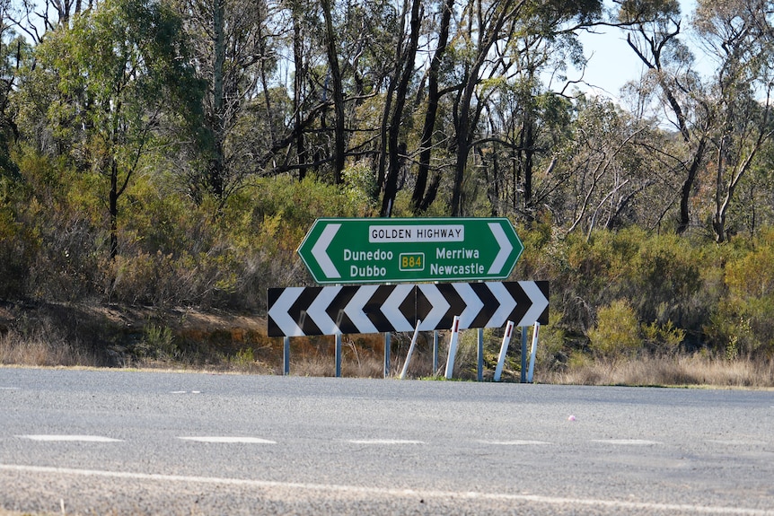 A road sign for the Golden Highway