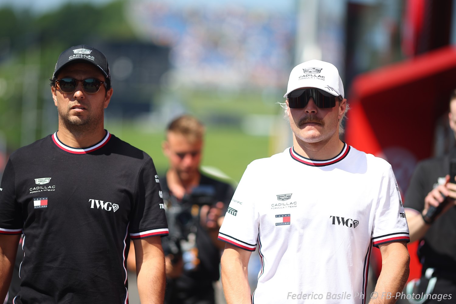 11 Sergio Perez and 77 Valtteri Bottas, (FIN), Cadillac Ferrari F1 Team, during the Austrian GP, Spielberg 25-28 June 2026, Red Bull Ring, Formula 1 World Championship 2026.