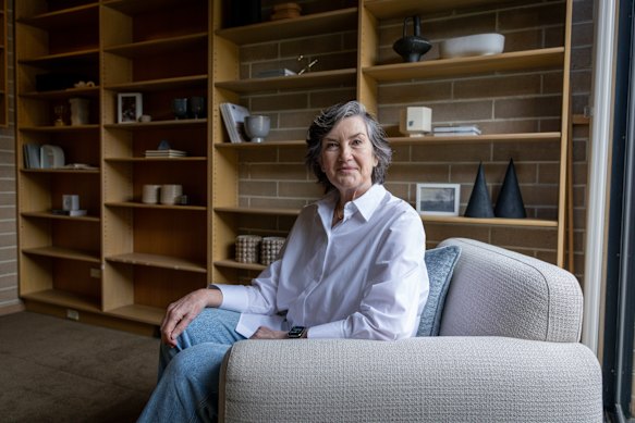 Esther Clerehan, the daughter of acclaimed Melbourne mid-century architect Neil Clerehan, sits in the study of his most famous home, Fenner House.