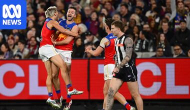Brisbane beats Collingwood by 10 goals as Logan Morris kicks eight, giving Lions control of third spot