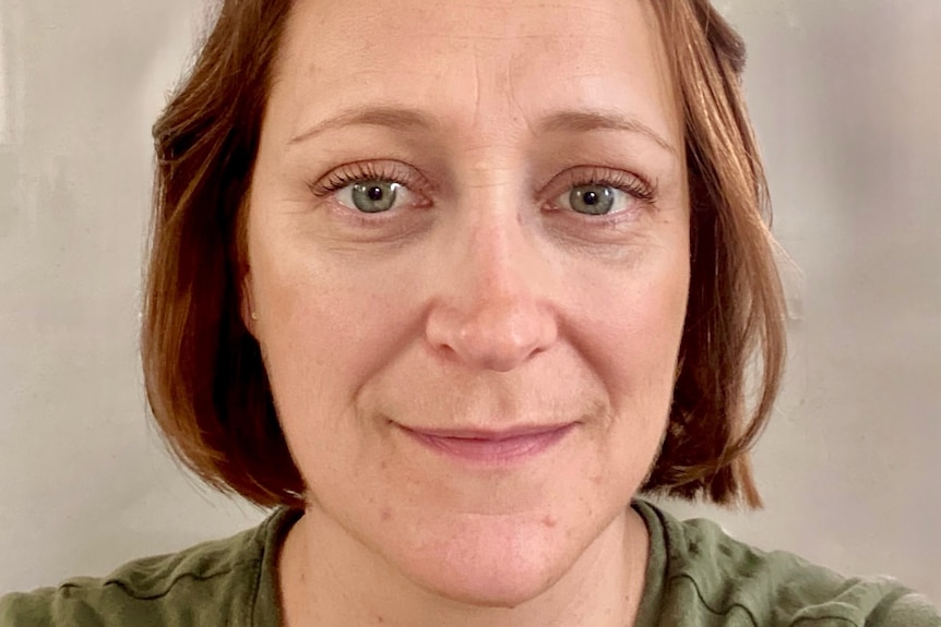 A close up of a woman's face.