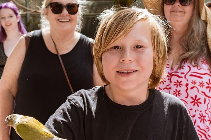 A 10-year-old boy and a bird