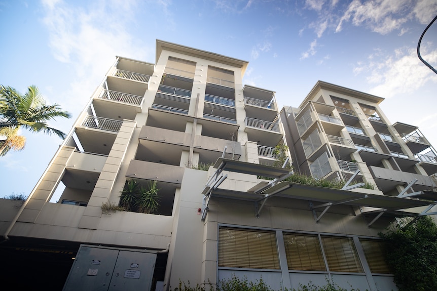 A sand coloured block of apartments
