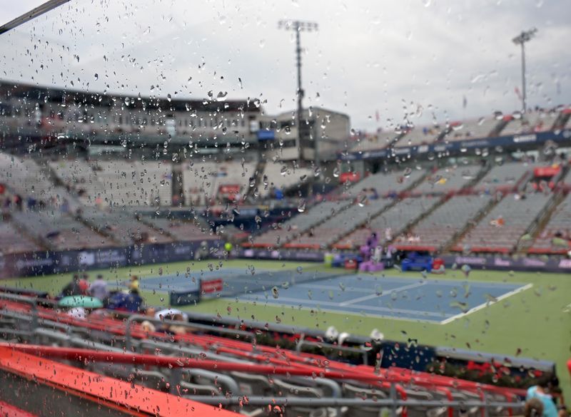 Tennis: Tennis-Rain disrupts Washington Open final, halts play in Canada