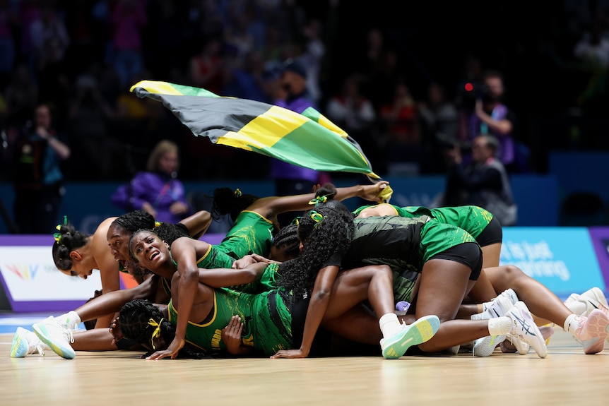 Jamaica celebrates defeating Australia in netball.