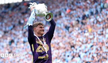 Carl Rushworth holds the 2025-26 Championship trophy aloft