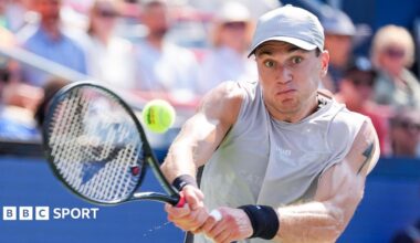 Jack Draper strikes the ball with his racquet