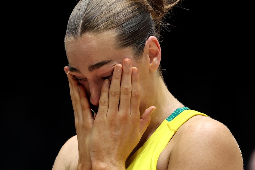 Diamonds shooter Sophie Garbin cries after the Commonwealth Games bronze medal netball match against England.