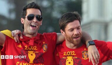 Alvaro Arbeloa and Xabi Alonso celebrating after winning the 2012 European Championships with the Spanish national team