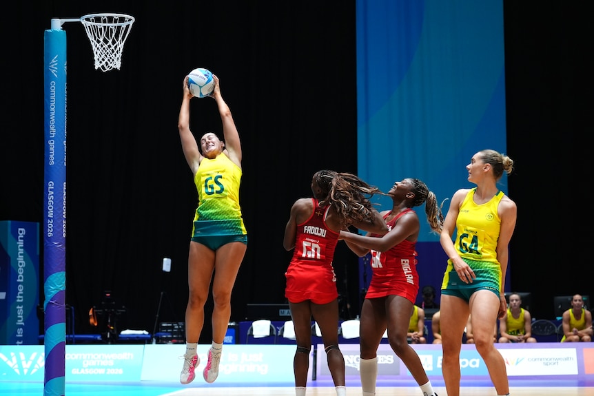 Diamonds shooter Sophie Garbin jumps to catch a pass during the Commonwealth Games bronze medal netball match against England.