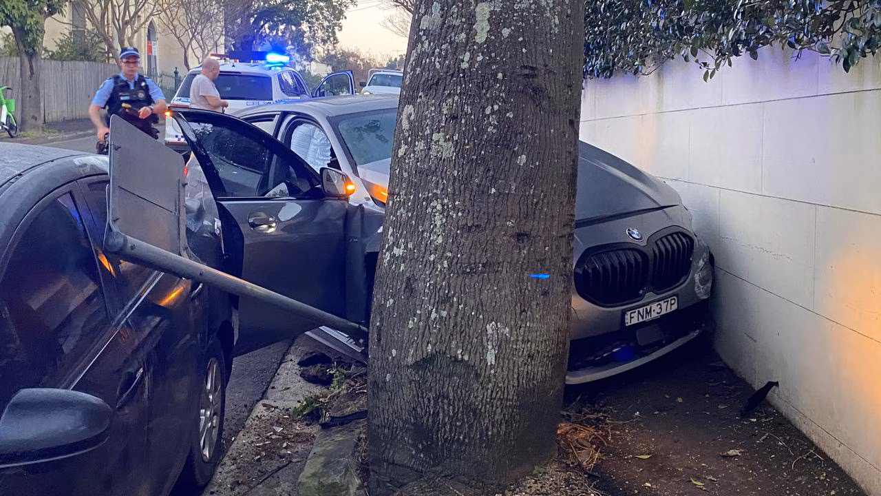 Chaos as knife-wielding thief crashes car in Sydney’s inner west