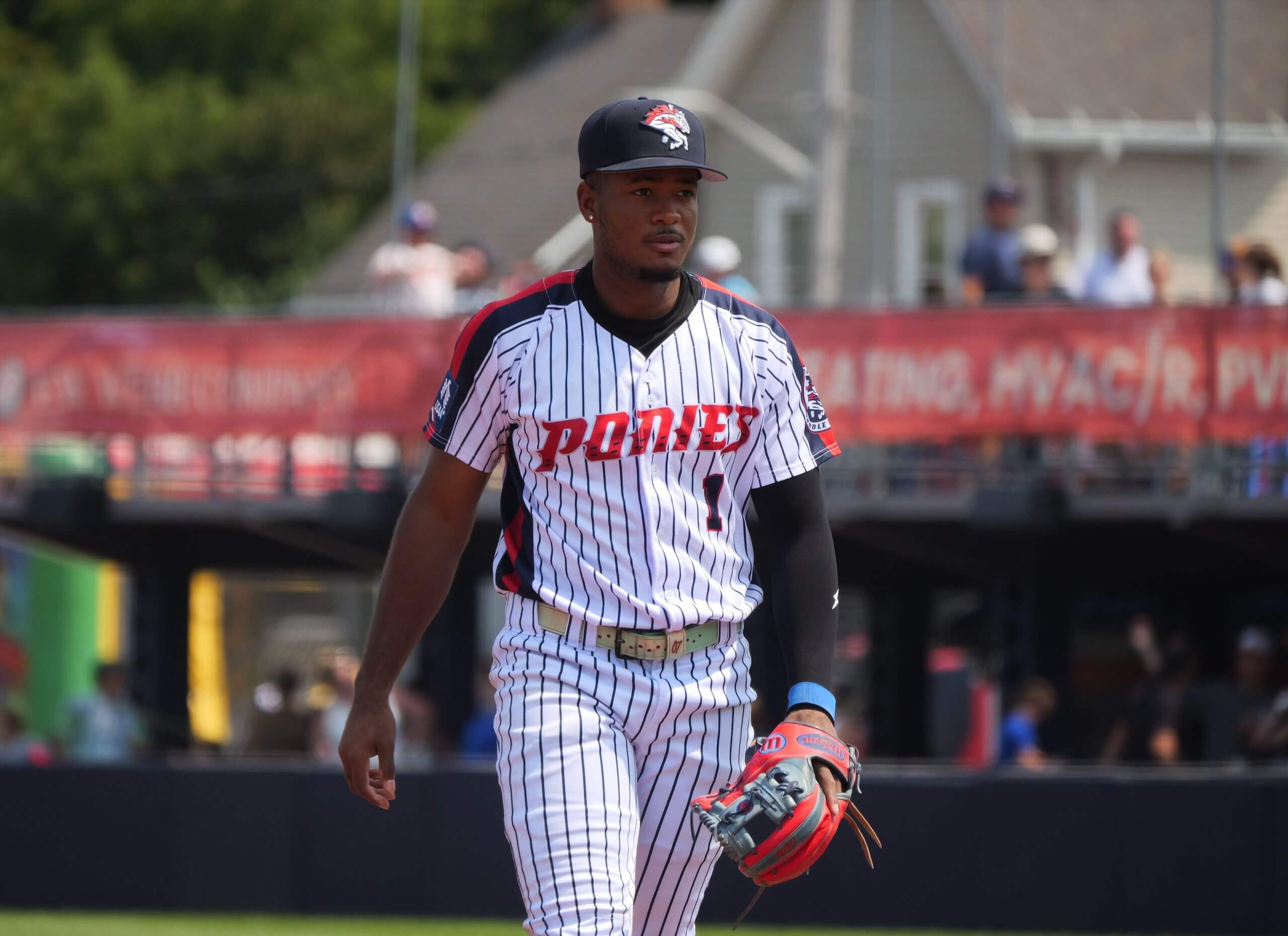 Jefferson Rojas walks off the field with a focused look. 