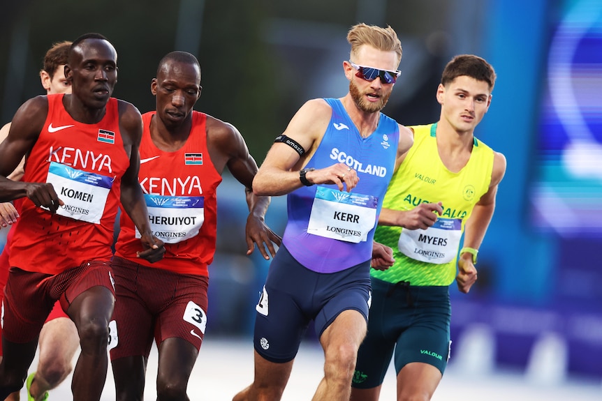 Josh Kerr leads Cameron Myers and the mile field at the Glasgow Commonwealth Games.