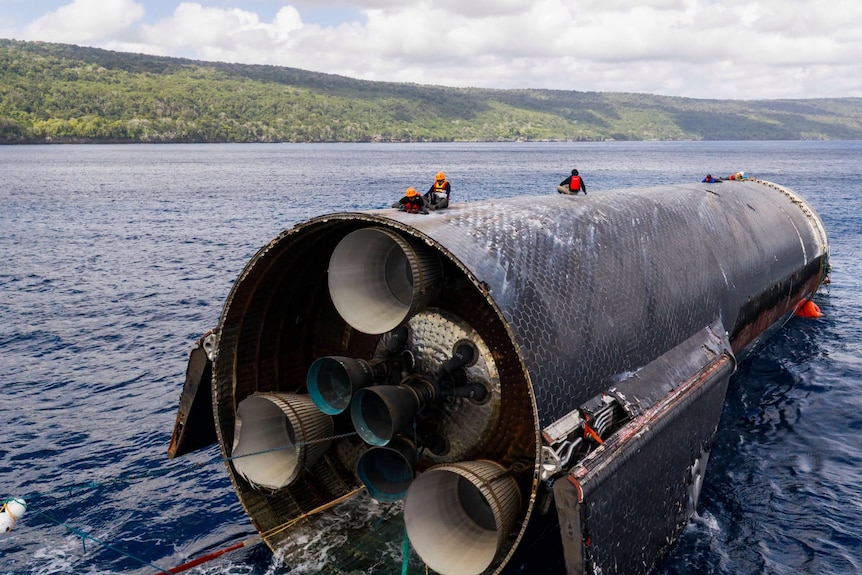 Rough weather hampered efforts to retrieve the rocket after splashdown.
