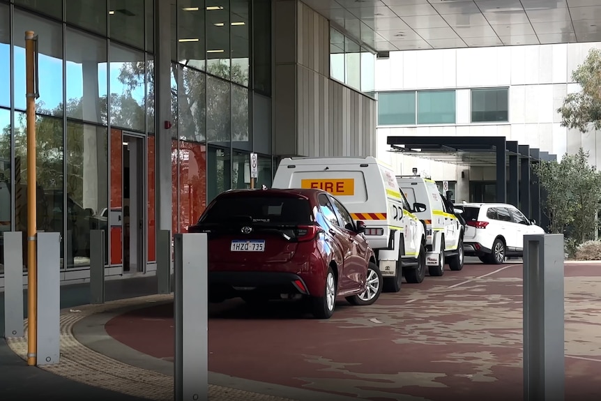 Parked fire car seen outside Fiona Stanley Hospital.