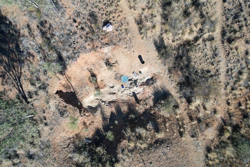 Drone shot of dry arid landscape above a fossil pit