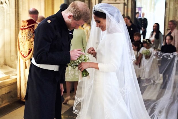 Meghan, the Duchess of Sussex, with Prince Harry, the Duke of Sussex, inside St George's Chapel at Windsor Castle on May 19, 2018, in Windsor.