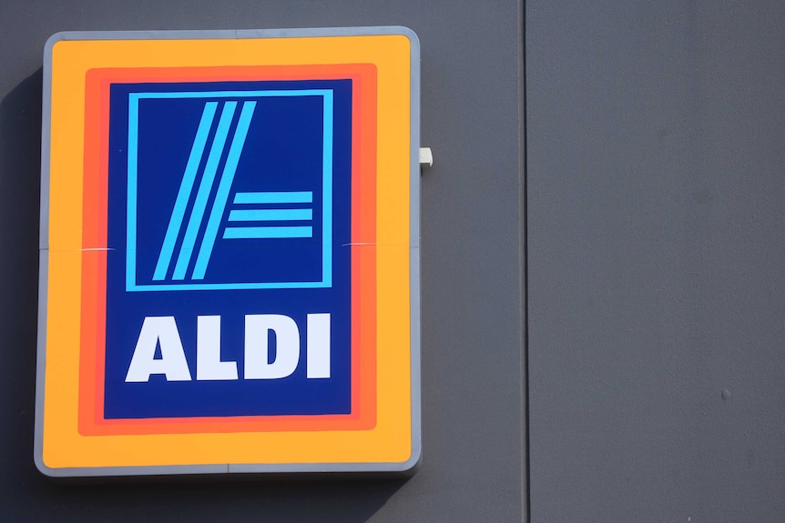 An Aldi logo on the side of a building.