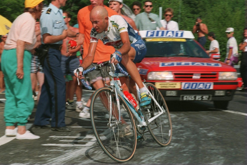 Marco Pantani rides his bike