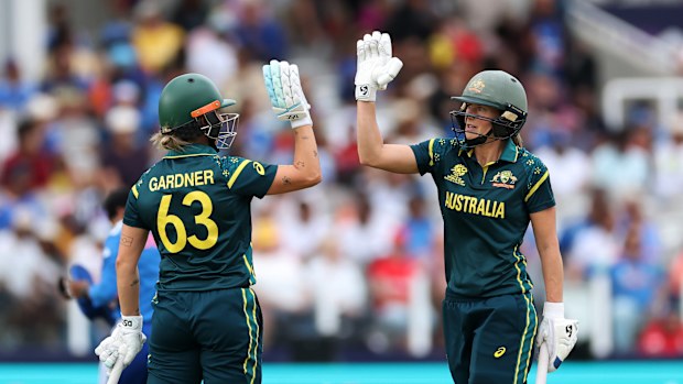 Ash Gardner celebrates her half-century with Ellyse Perry.