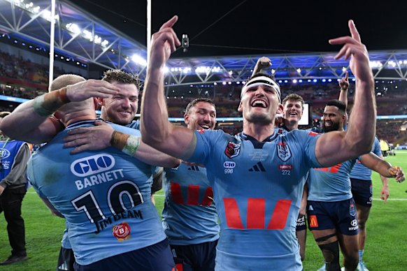 Nathan Cleary and the Blues celebrate at fulltime after winning game three and the series.