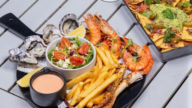 The seafood platter and the nachos.