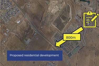 An aerial map with markings saying "proposed residential development' and "800m".