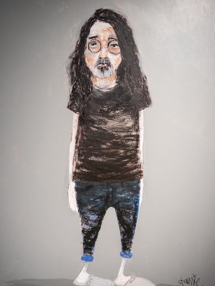 Black, white and grey artwork of a long-haired young man