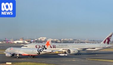 Sydney Airport near miss involving Jetstar and Qatar planes leaves crew member injured