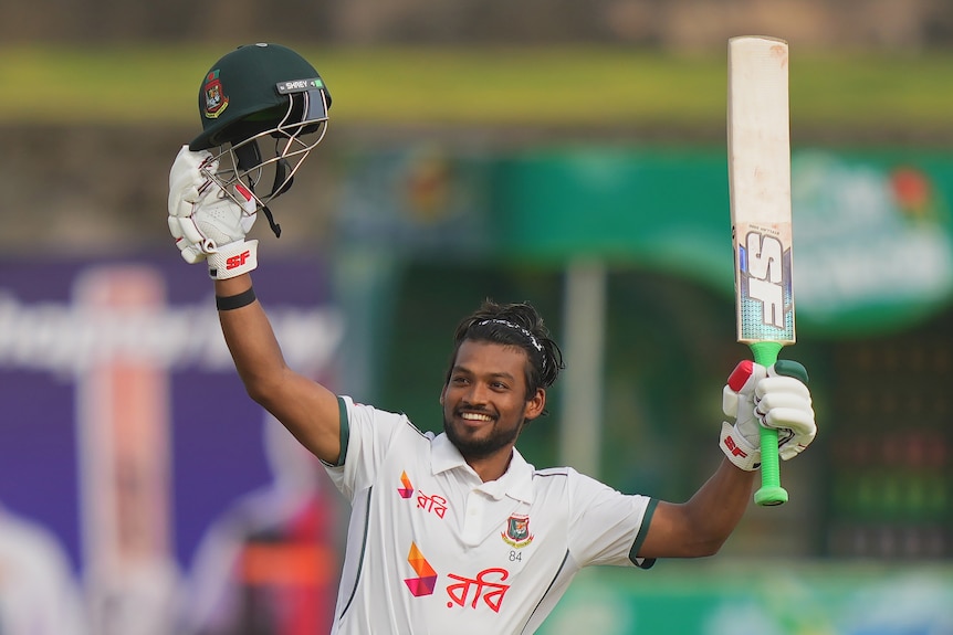 Najmul Hossain Shanto holds up his bat